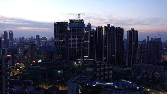 延时摄影航拍夕阳晚霞落日夜景城市建设素材视频的预览图