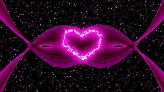 在黑色背景上移动粉色粒子中的发光情人的心视频的预览图