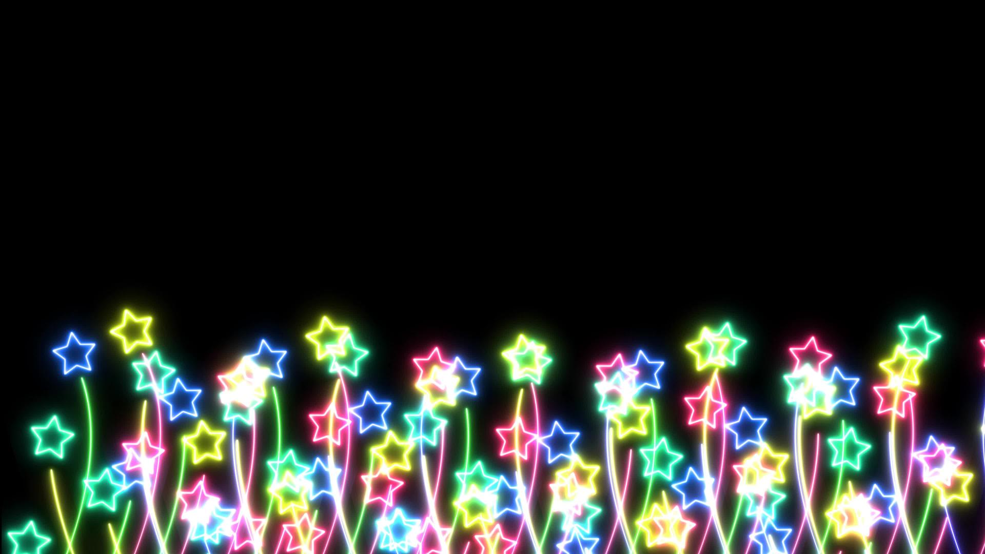 五颜六色的花大大小小的花和星星在黑屏上慢慢地跳舞视频的预览图