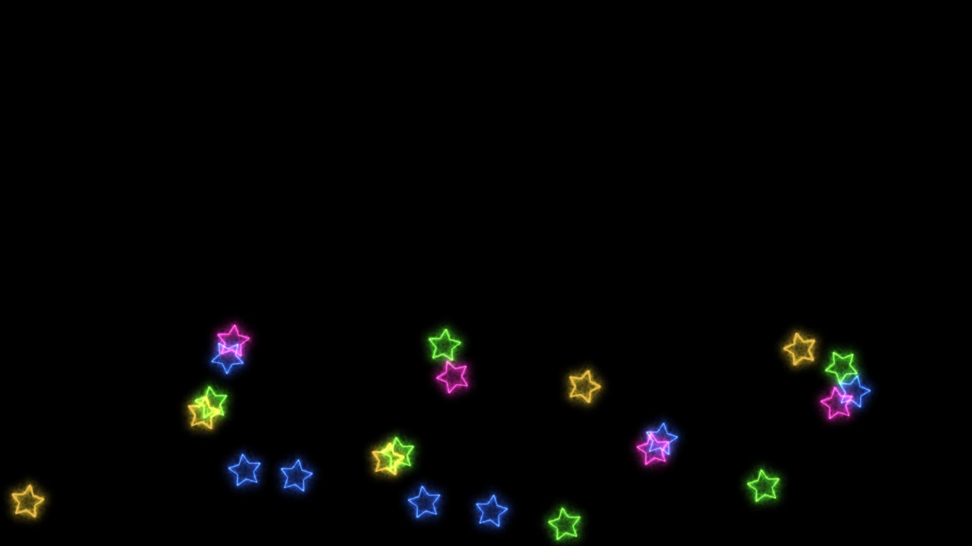 彩虹彩色恒星的随机颜色漂浮在黑屏上视频的预览图