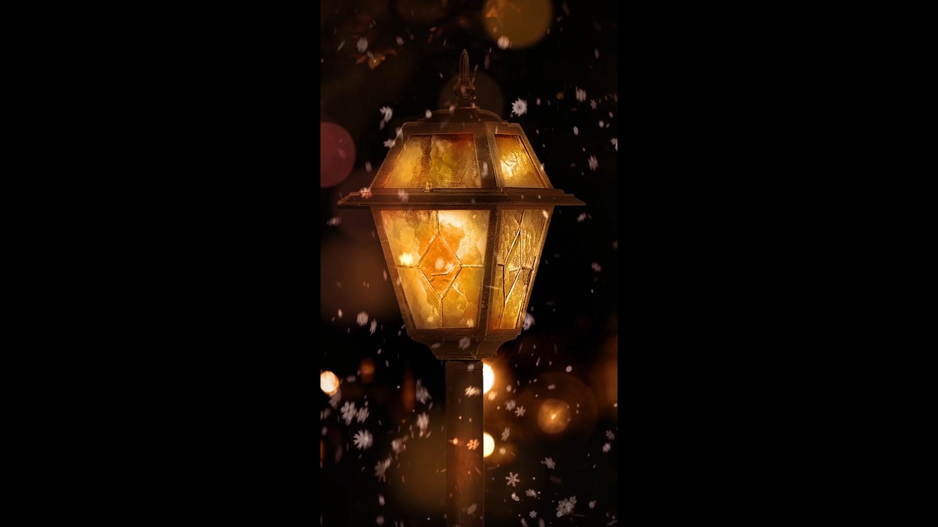 夜晚灯光雪景下雨浪漫背景视频的预览图