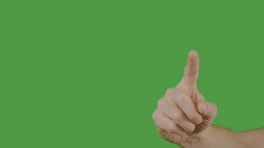 绿色背景上的男性食指触摸屏幕视频的预览图