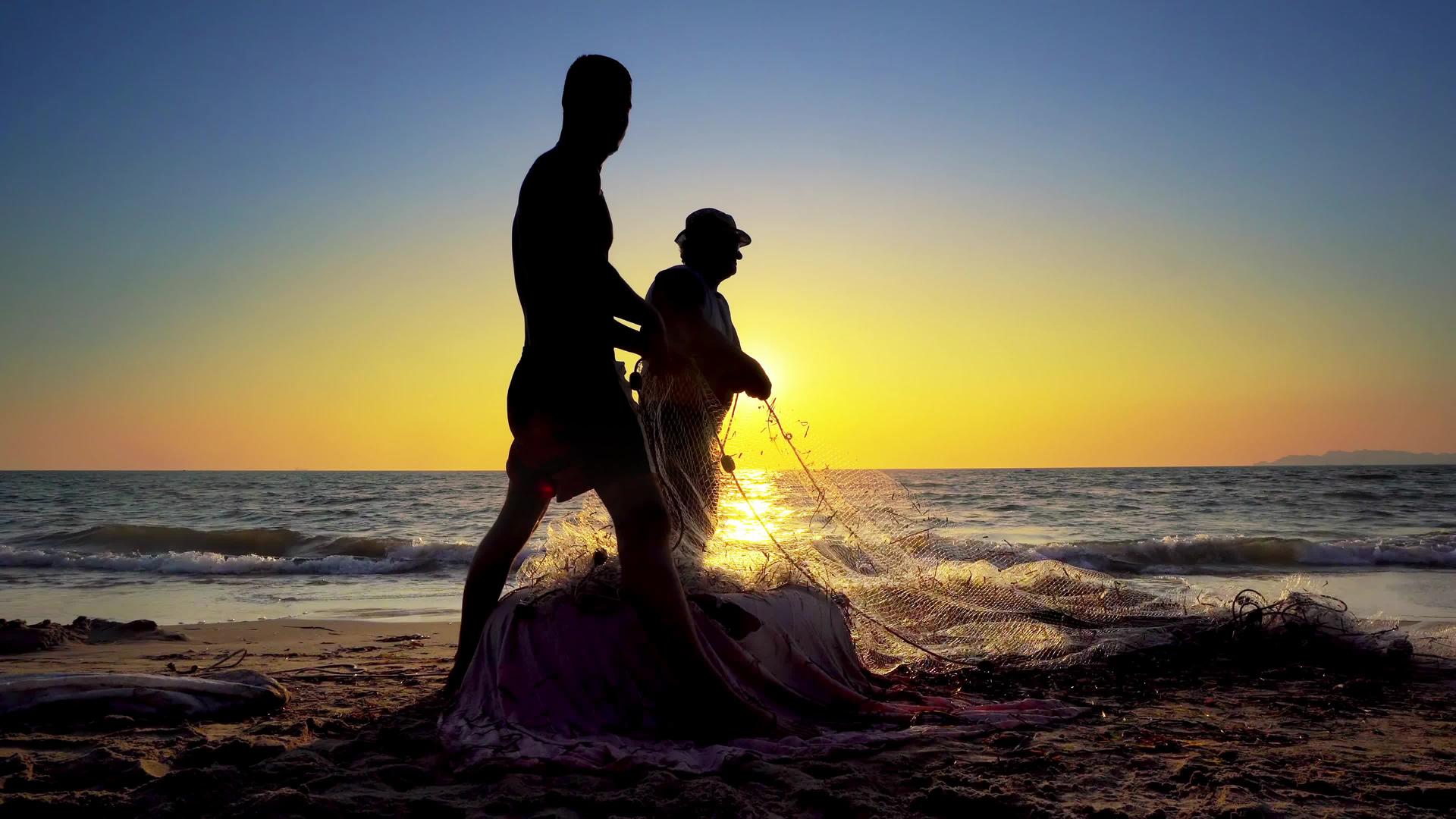 日落海滩电影制片人Standicam拍摄的渔网视频的预览图