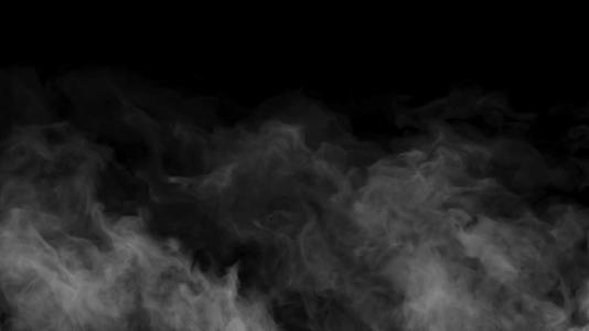 在黑暗的背景下烟雾的抽象云慢慢地抽出烟雾视频的预览图