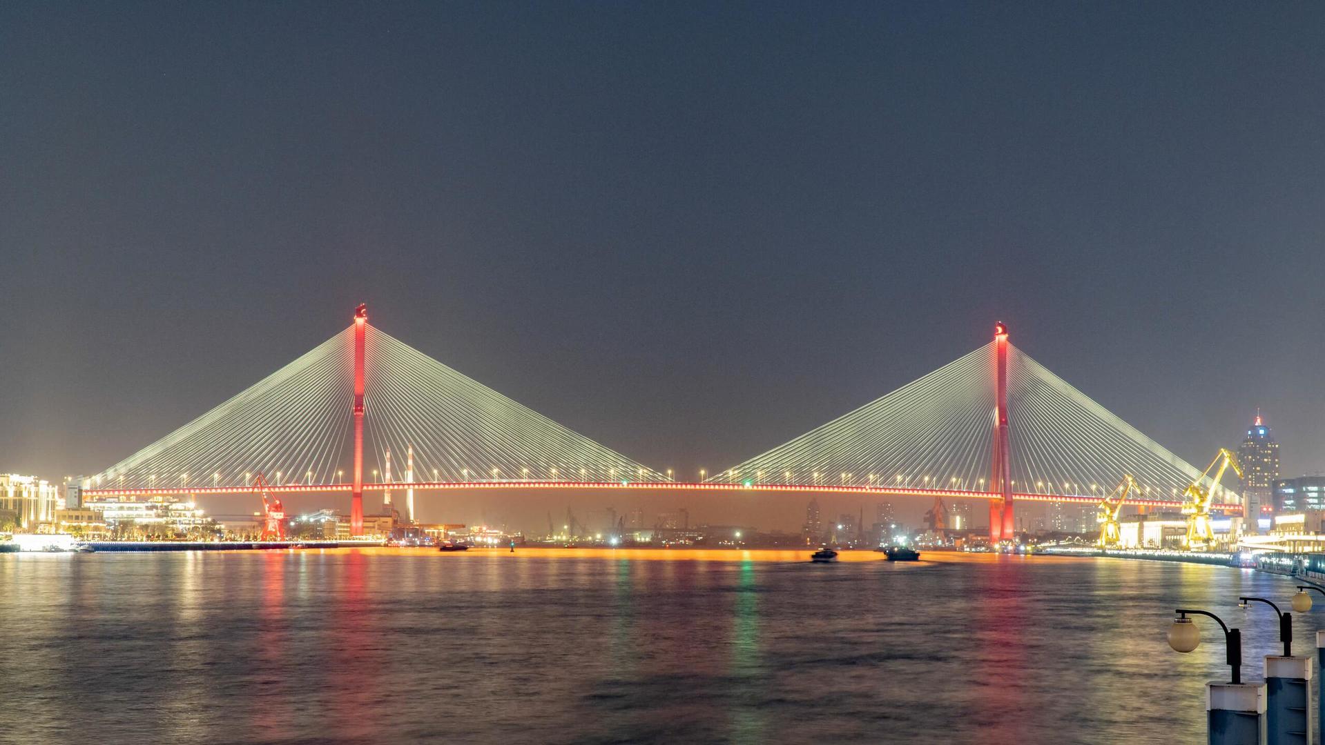 8k上海杨浦大桥地标夜景黄浦江轮船灯光交通延时摄影视频的预览图