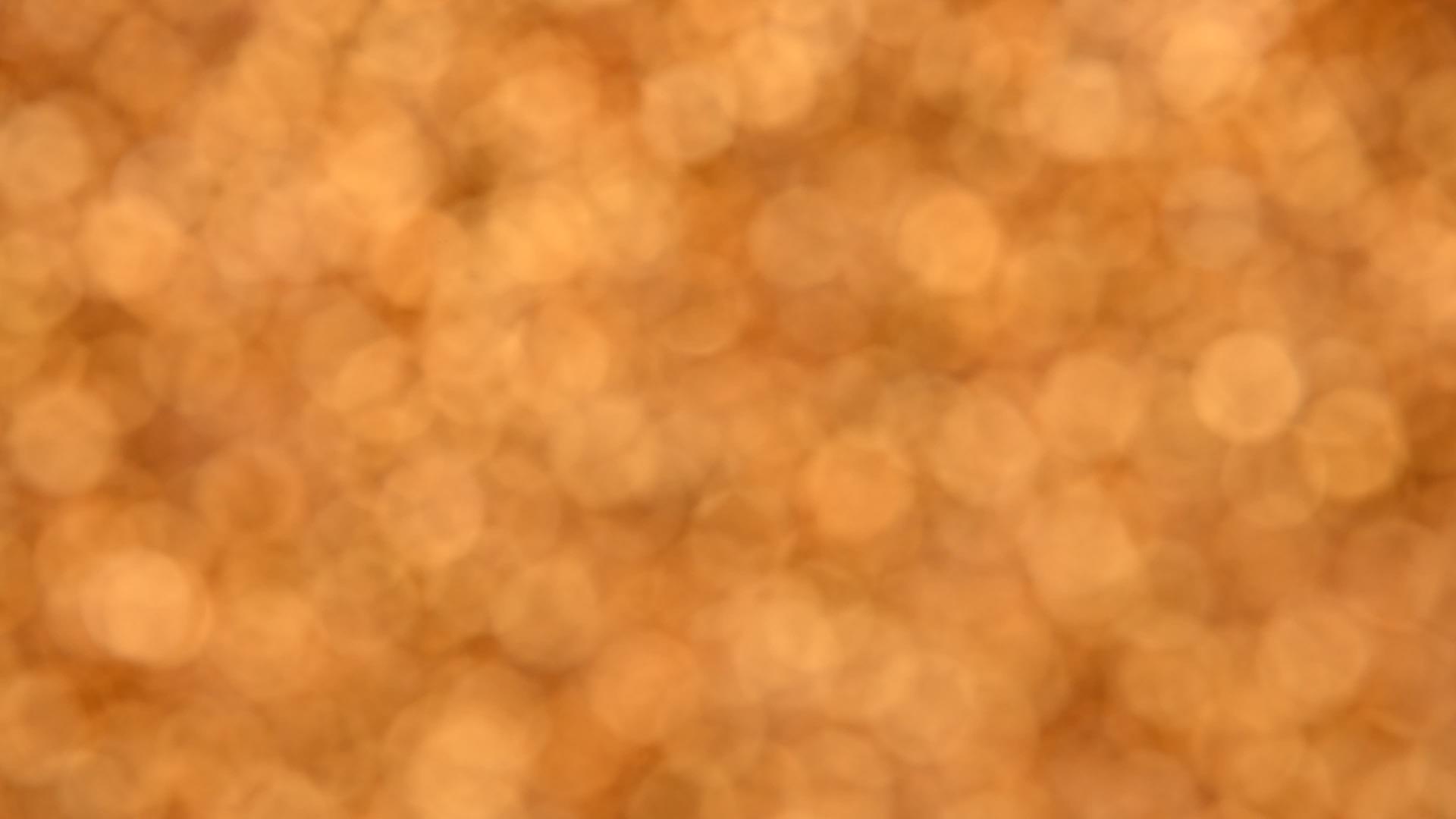 黄金bokeh抽象的旋转背景视频的预览图