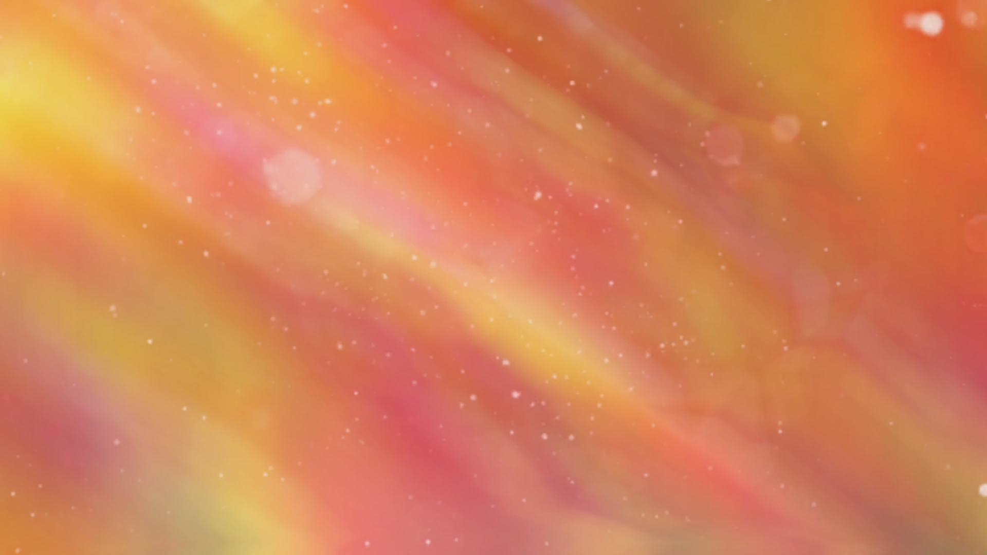 抽象的橙色背景与闪亮的粒子视频的预览图