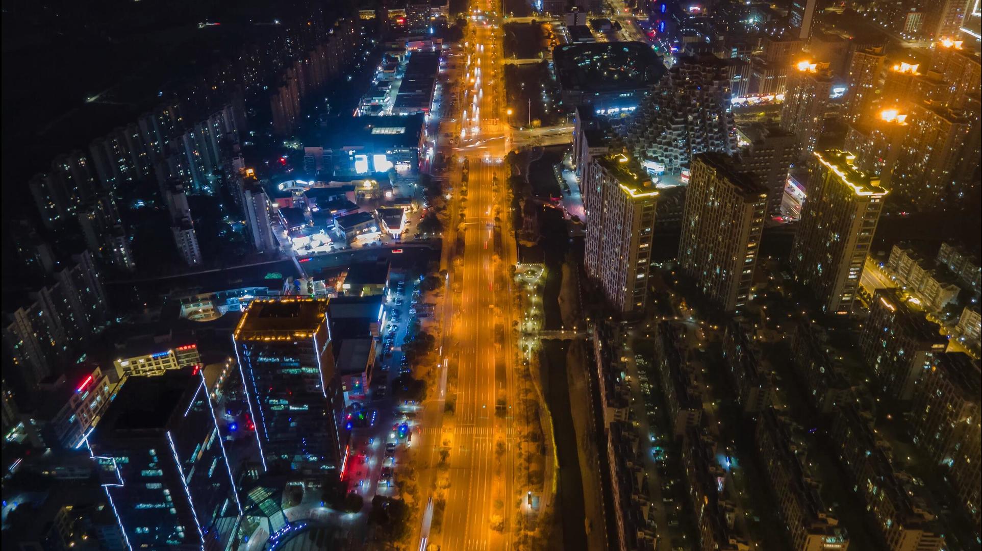4k城市航拍夜景马路车流灯光大楼发展中移动延时摄影视频的预览图