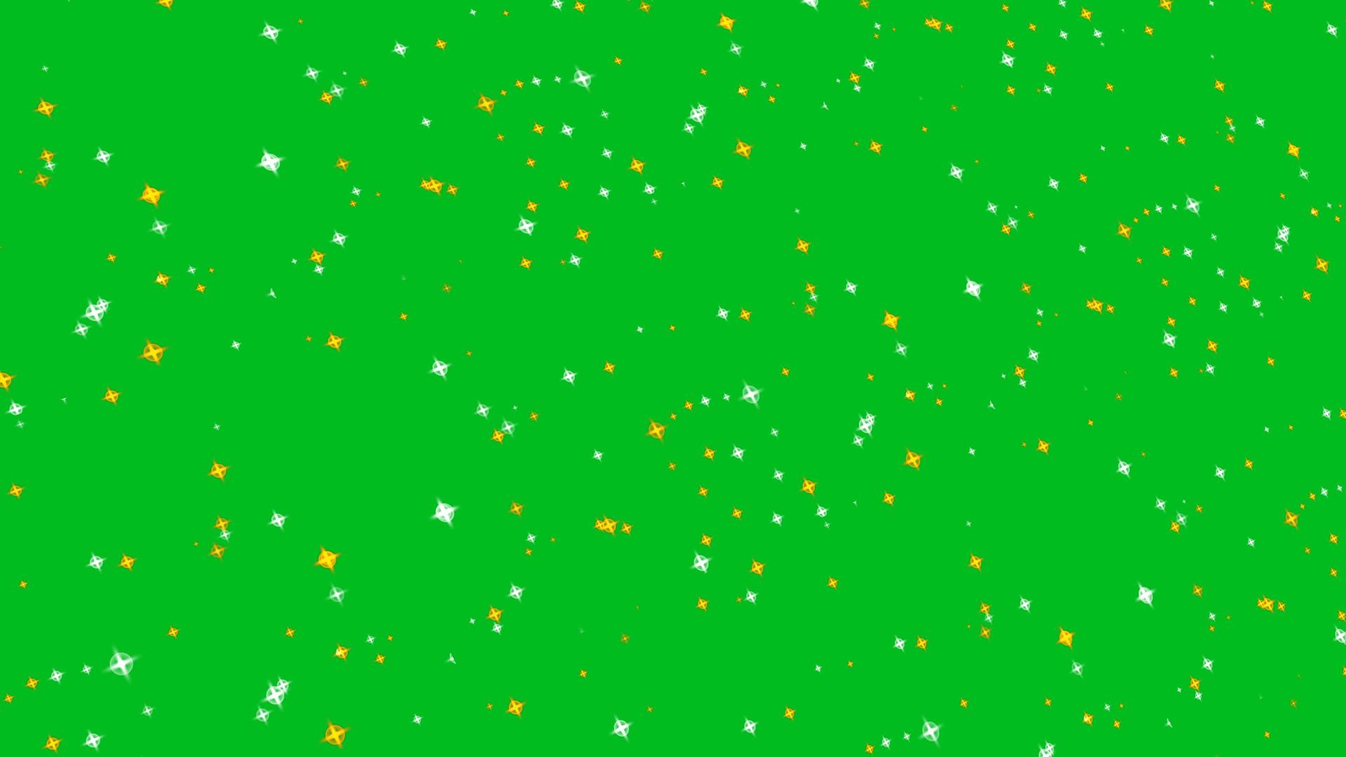 闪闪发光的粒子银和金星在绿色屏幕的背景下慢慢消失视频的预览图