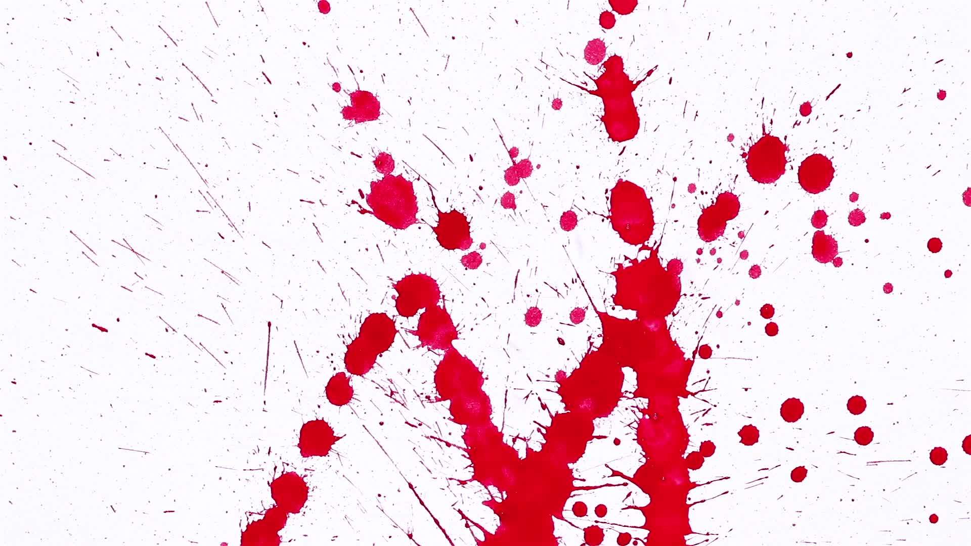 红色粉笔喷在白纸上视频的预览图