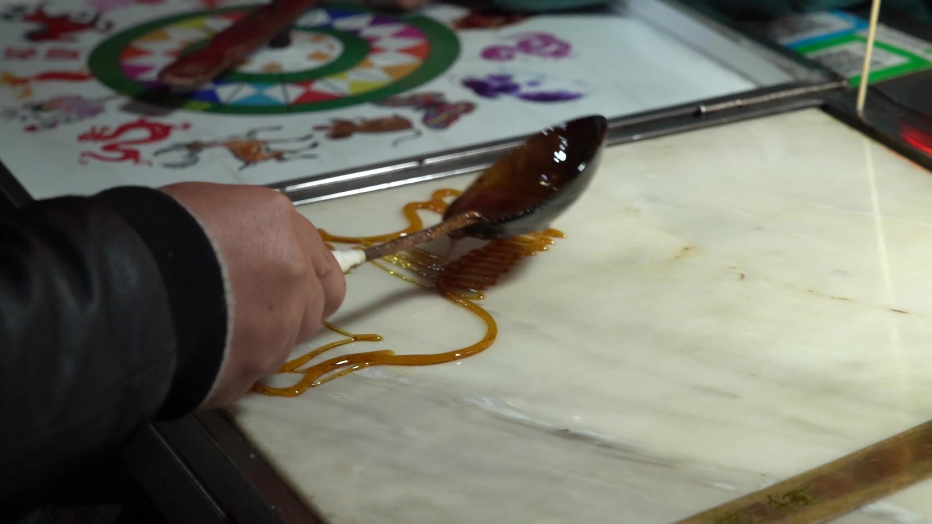 4K非物质文化遗产糖画制作民间艺术升级视频视频的预览图