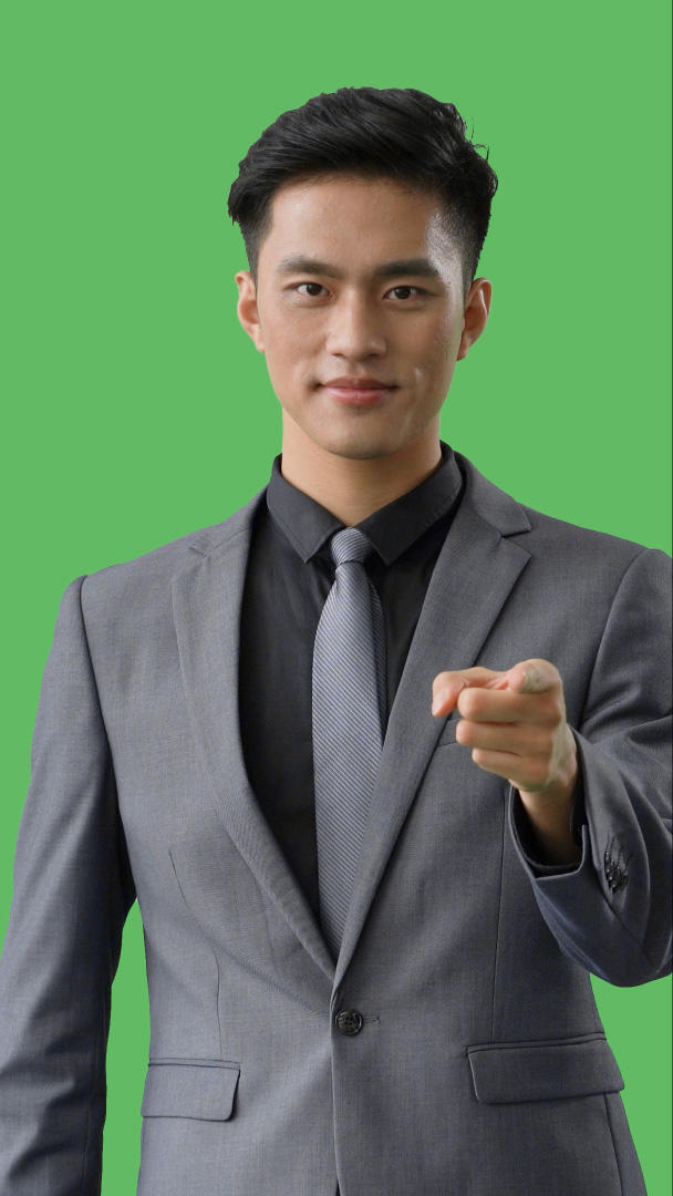 绿幕商户抠像穿西装的商务男性举手指向镜头动作视频的预览图