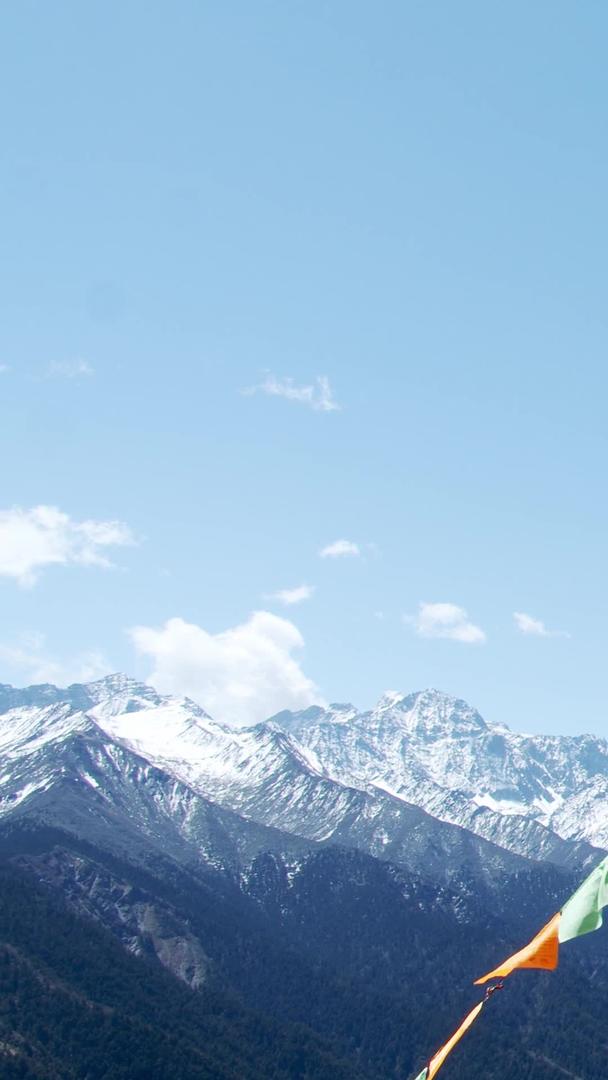 雪山森林蓝天白云实拍五彩经幡视频的预览图