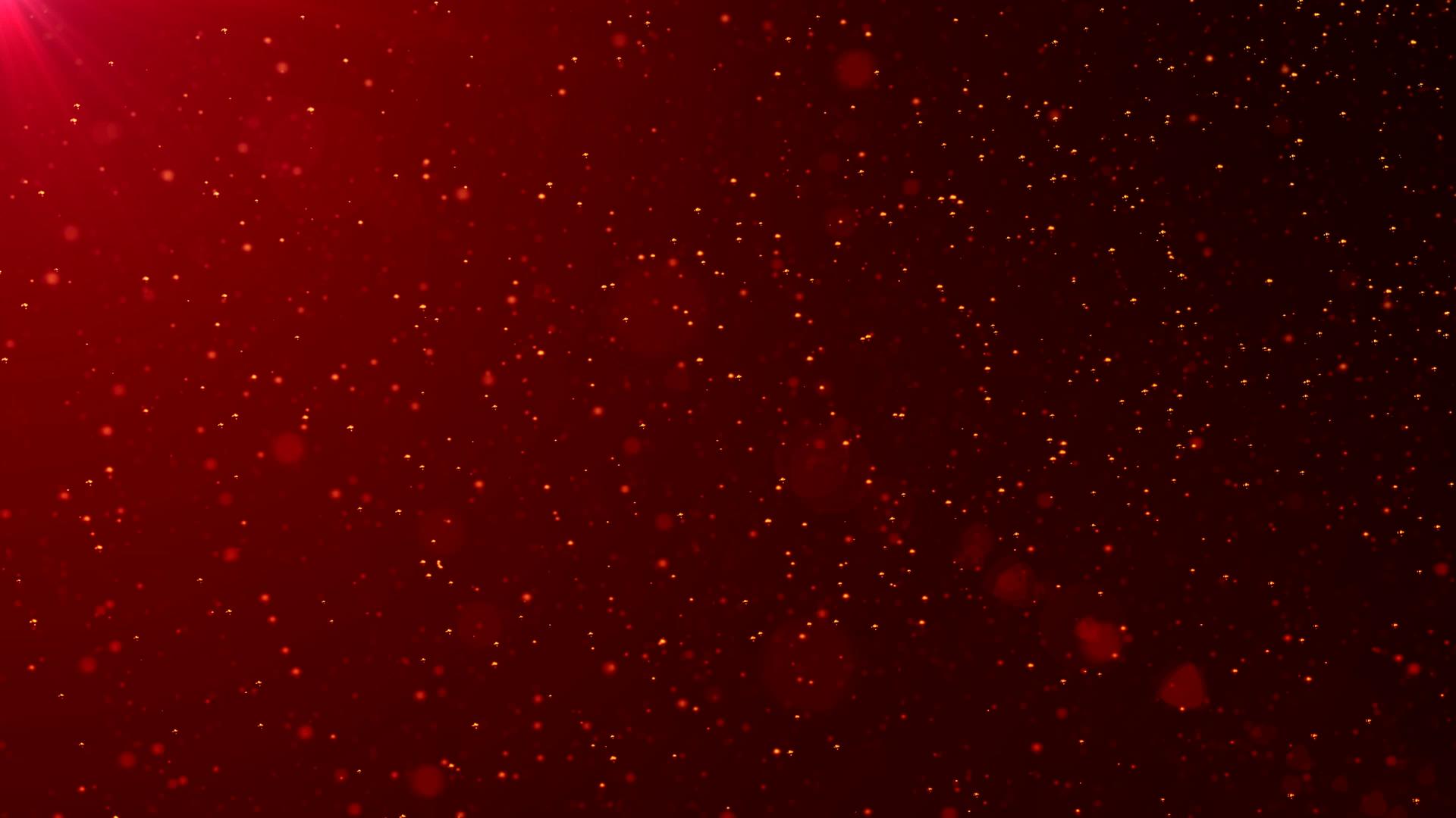 金颗粒缓慢悬浮在红色空间的底部视频的预览图
