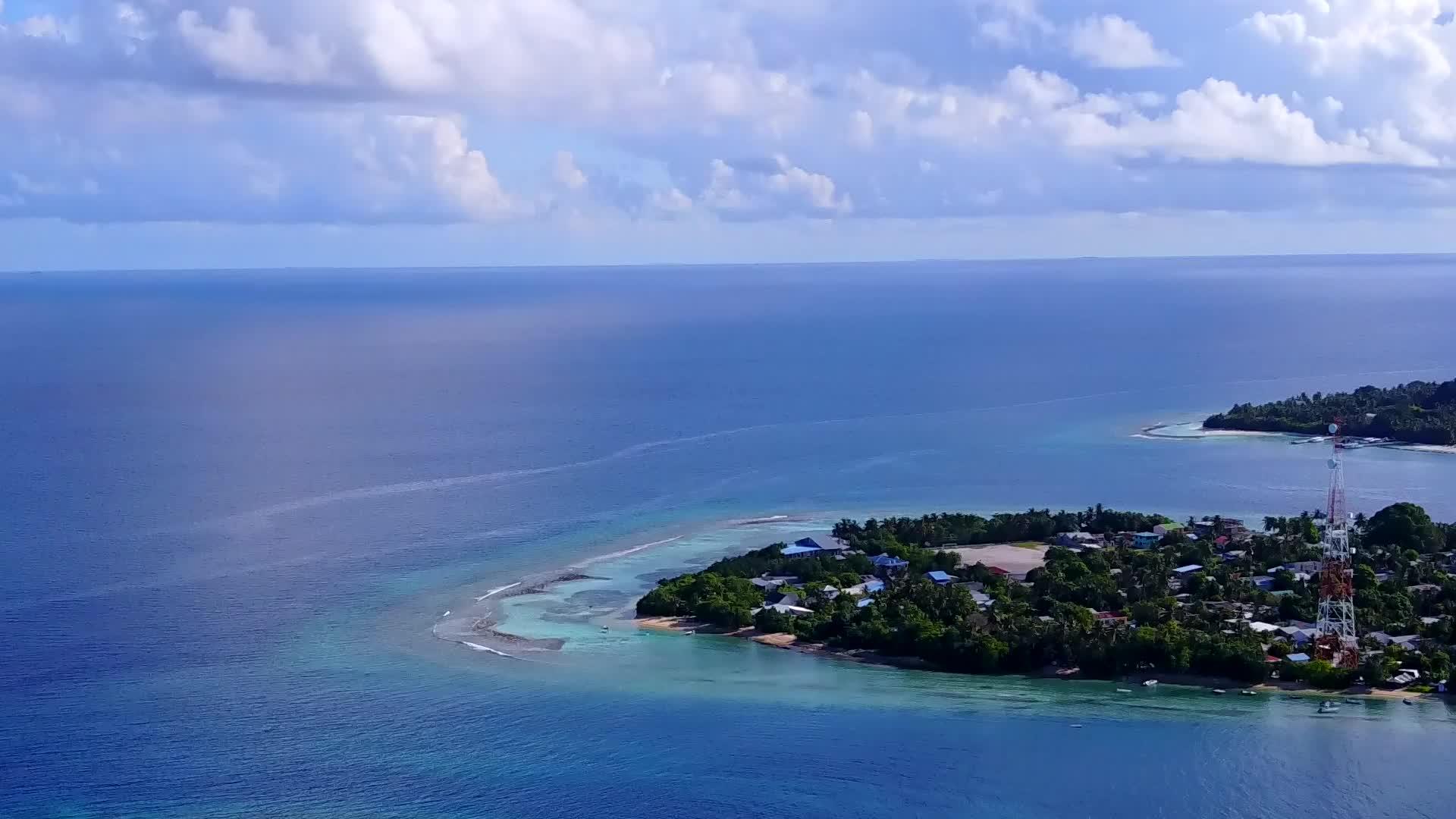 蓝色环礁的无人驾驶飞机放松岛屿视频的预览图