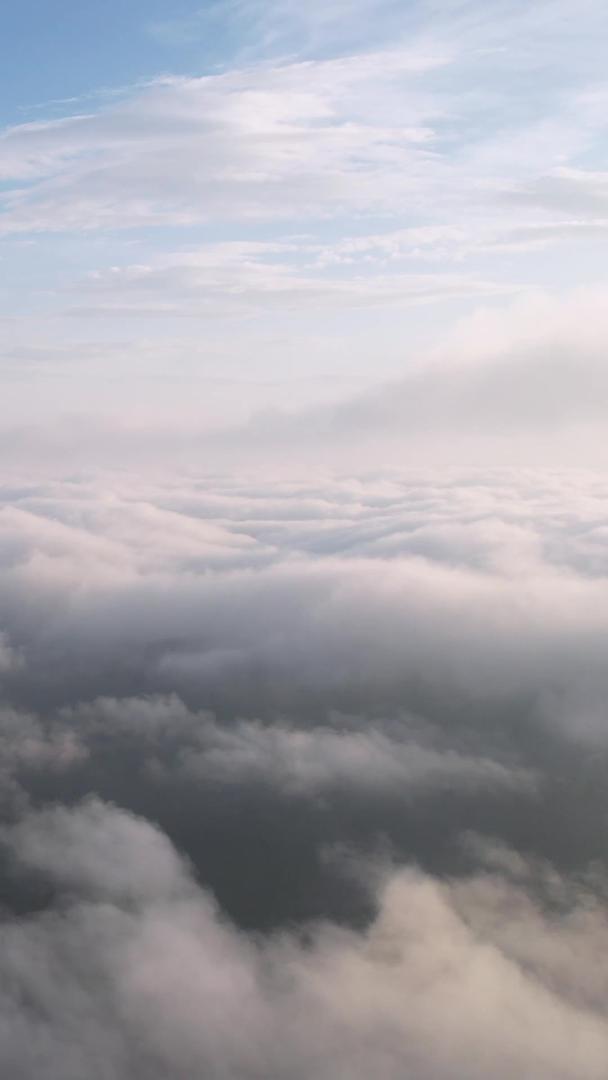 高空航拍穿过云雾缭绕的蓝天白云自然天空风光素材视频的预览图