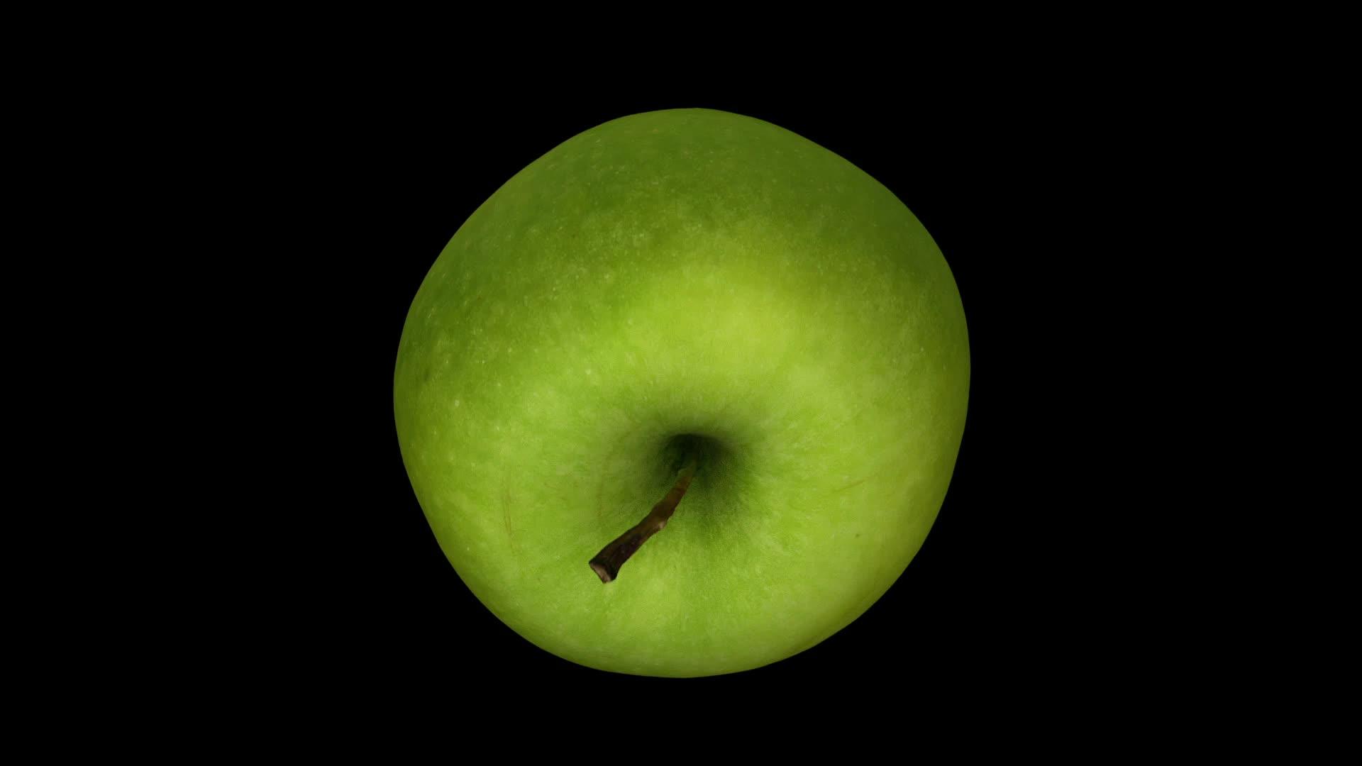 在黑色背景01b旋转绿苹果视频的预览图