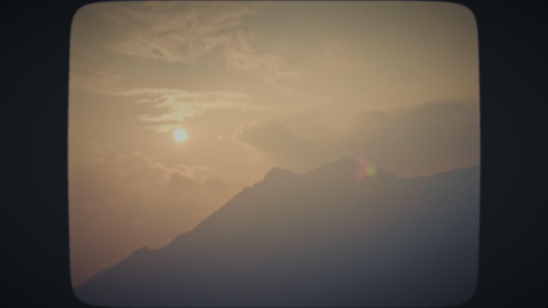 山峰后日落视频的预览图