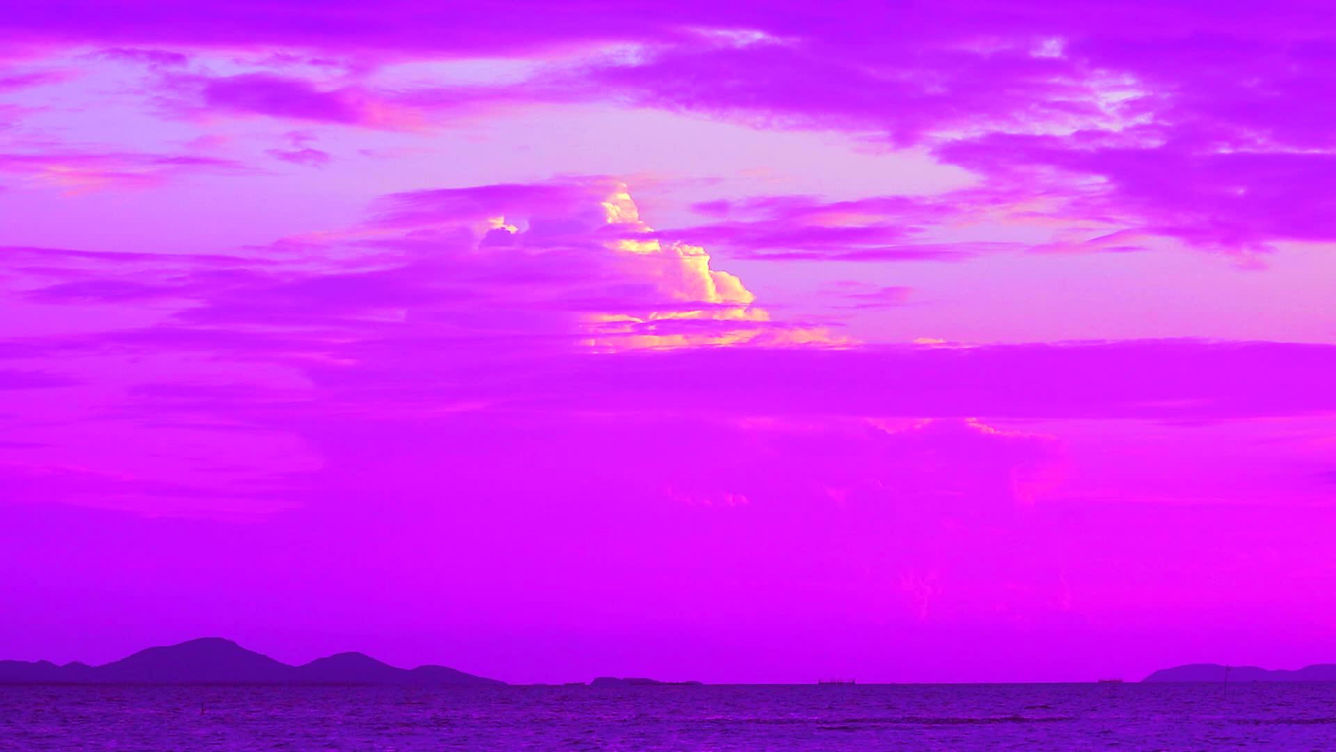 紫云、洋红黄日落、天空、海洋和地平线岛屿视频的预览图
