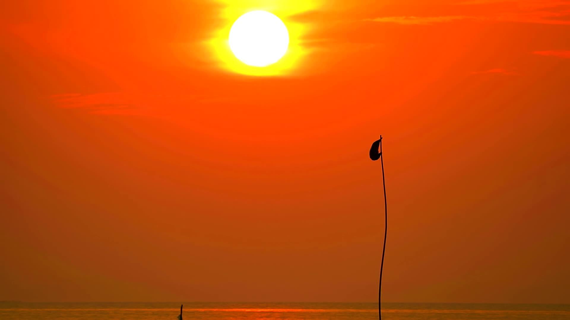 红天在海面日落视频的预览图