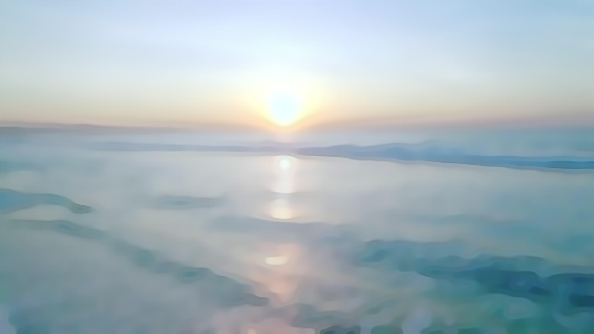 黄昏时分海滩上的日落和柔软的大海模糊了视频转换的背景视频的预览图