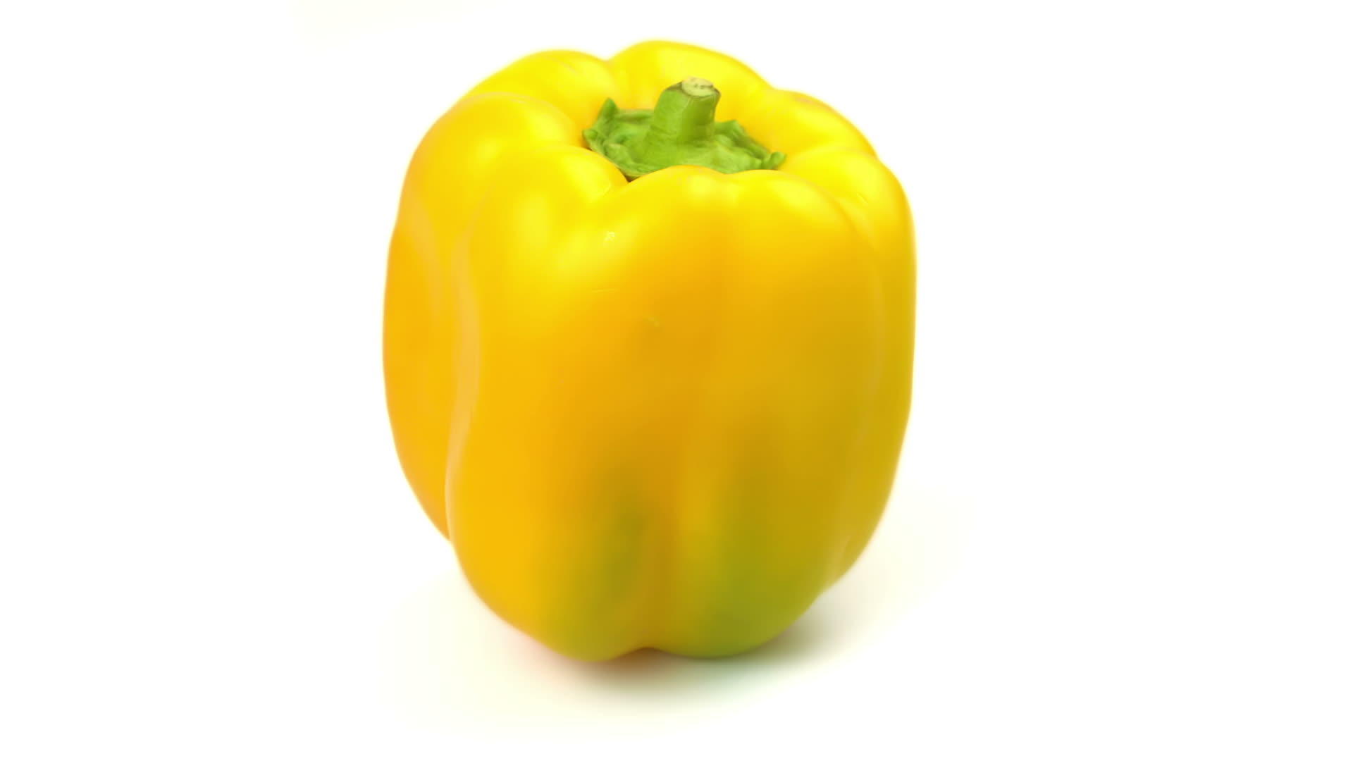 黄胡椒的白色背景视频的预览图