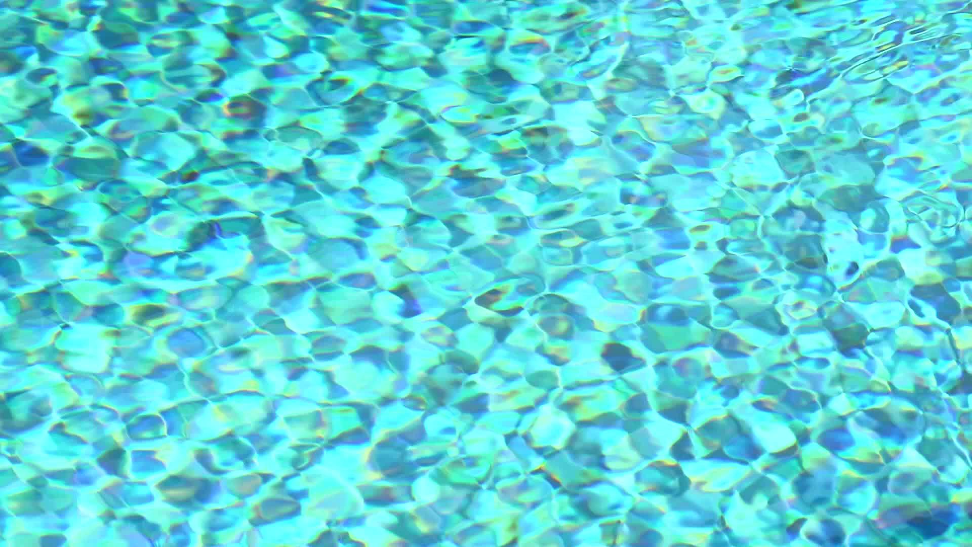 游泳池蓝色瓷砖的水面背景视频的预览图