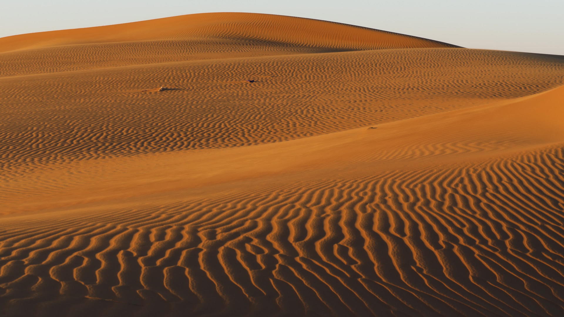 红色沙丘日落时的照片视频的预览图