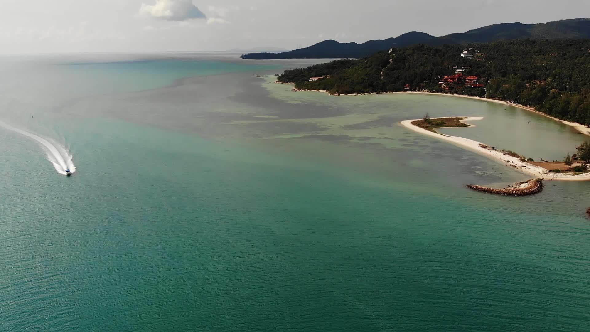 热带岛屿海滩附近的蓝色海洋在热带异国天堂帕岸岛旅游视频的预览图