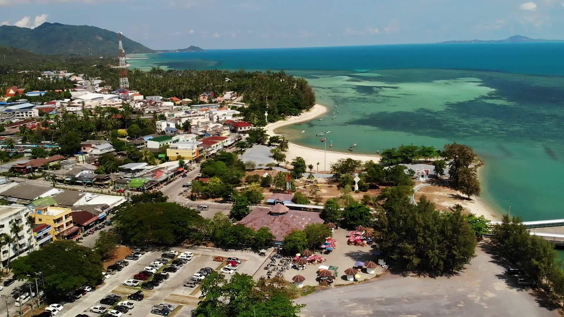 热带岛屿海滩附近的蓝色海洋在热带异国天堂帕岸岛旅游视频的预览图