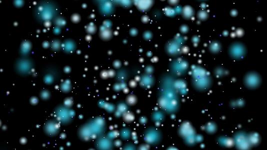 冰尘漂浮在深海的抽象粒子背景bokeh视频的预览图