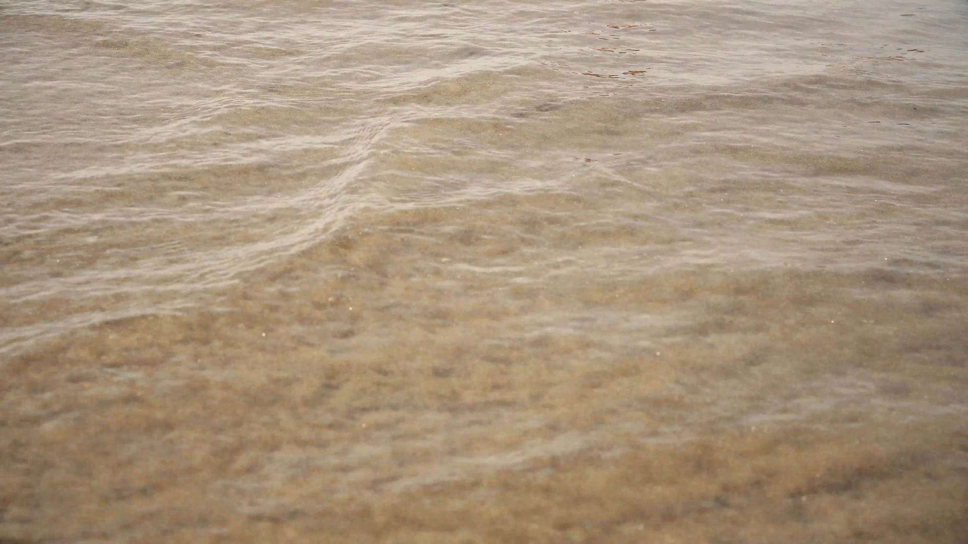 洗砂表面电影特别封闭背景的冷波视频的预览图