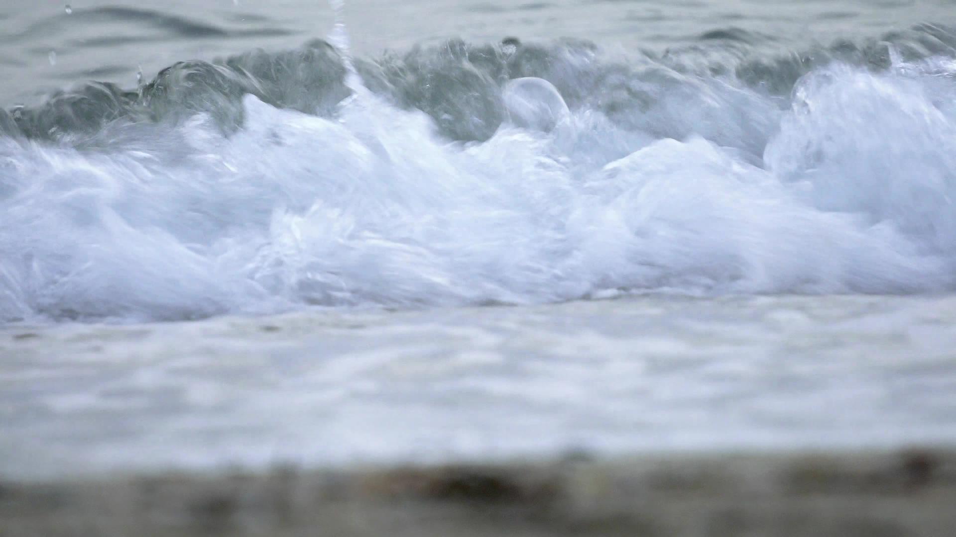沙沙沙滩上海浪的夏季背景视频的预览图