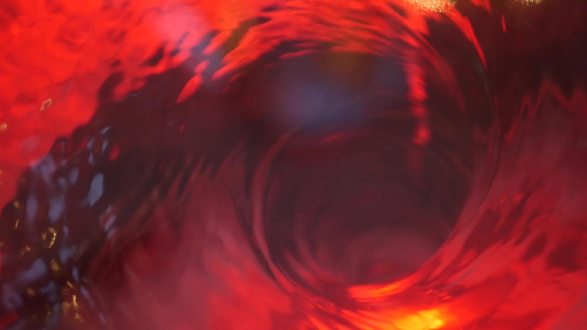 象征地狱的红色液体催眠水漩涡旋转视频的预览图