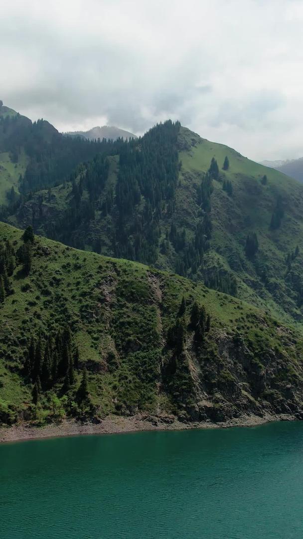 新疆天山天池景区航拍5A景区大天池及延绵山脉视频视频的预览图