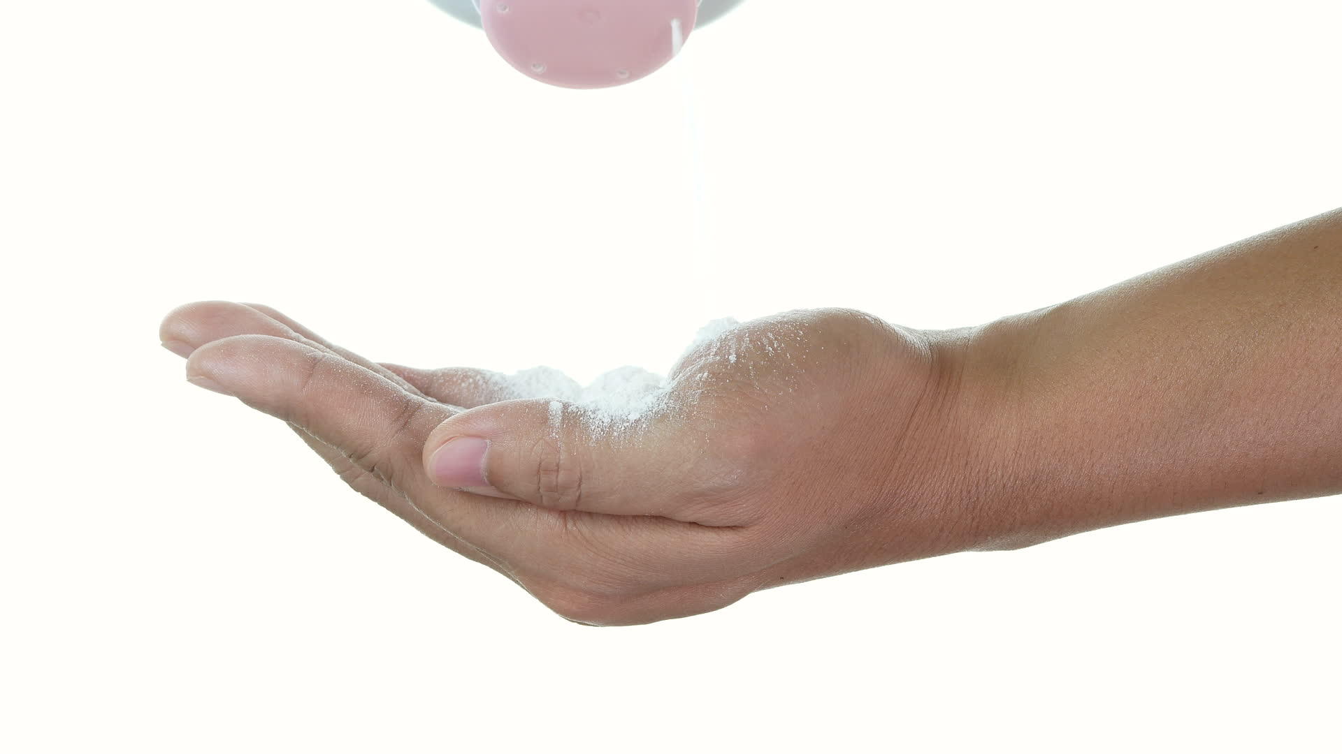 在白色背景中手里拿着白色奶粉紧紧地贴着女人倒在白色背景上视频的预览图