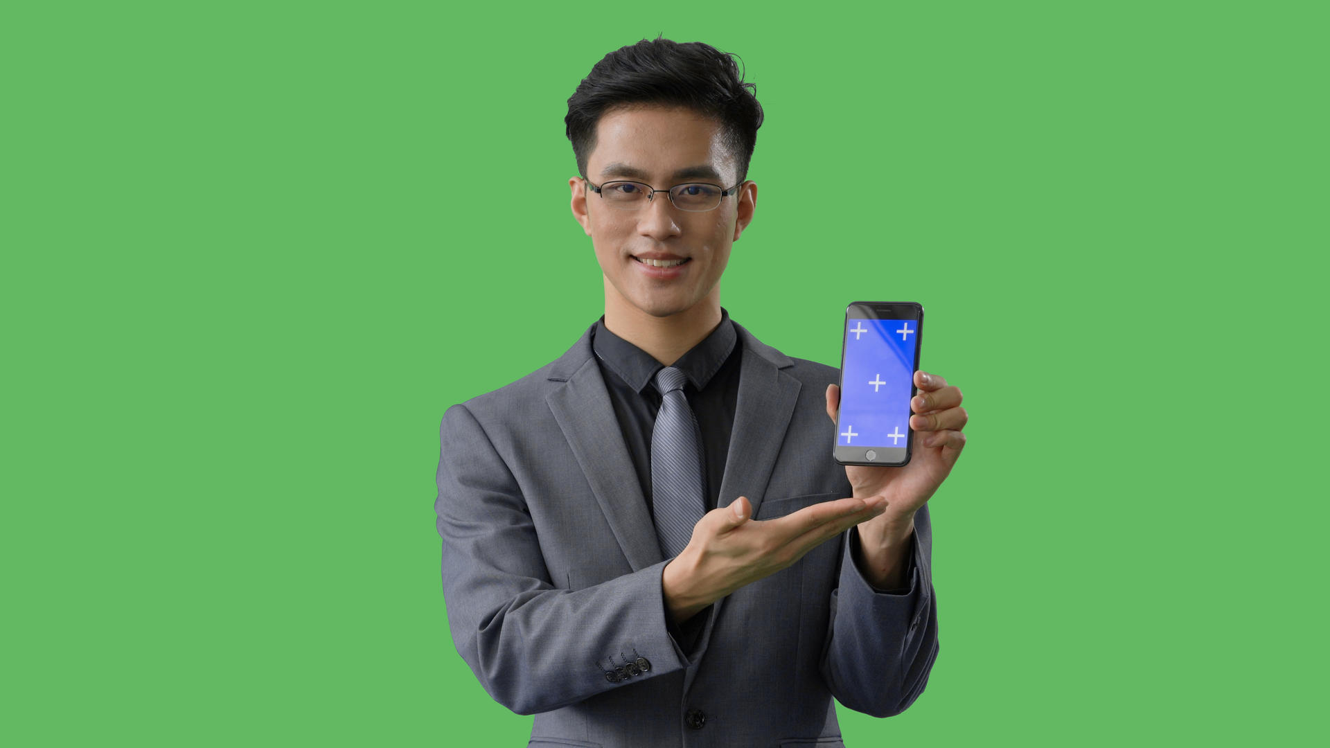 4k绿幕蓝幕合成戴眼镜的商务男性展示手机动作视频的预览图