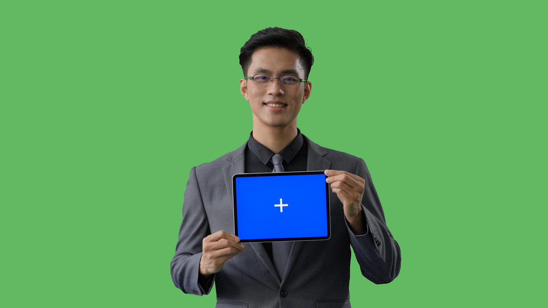 4k绿幕蓝幕合成商务男性展示平板电脑视频的预览图