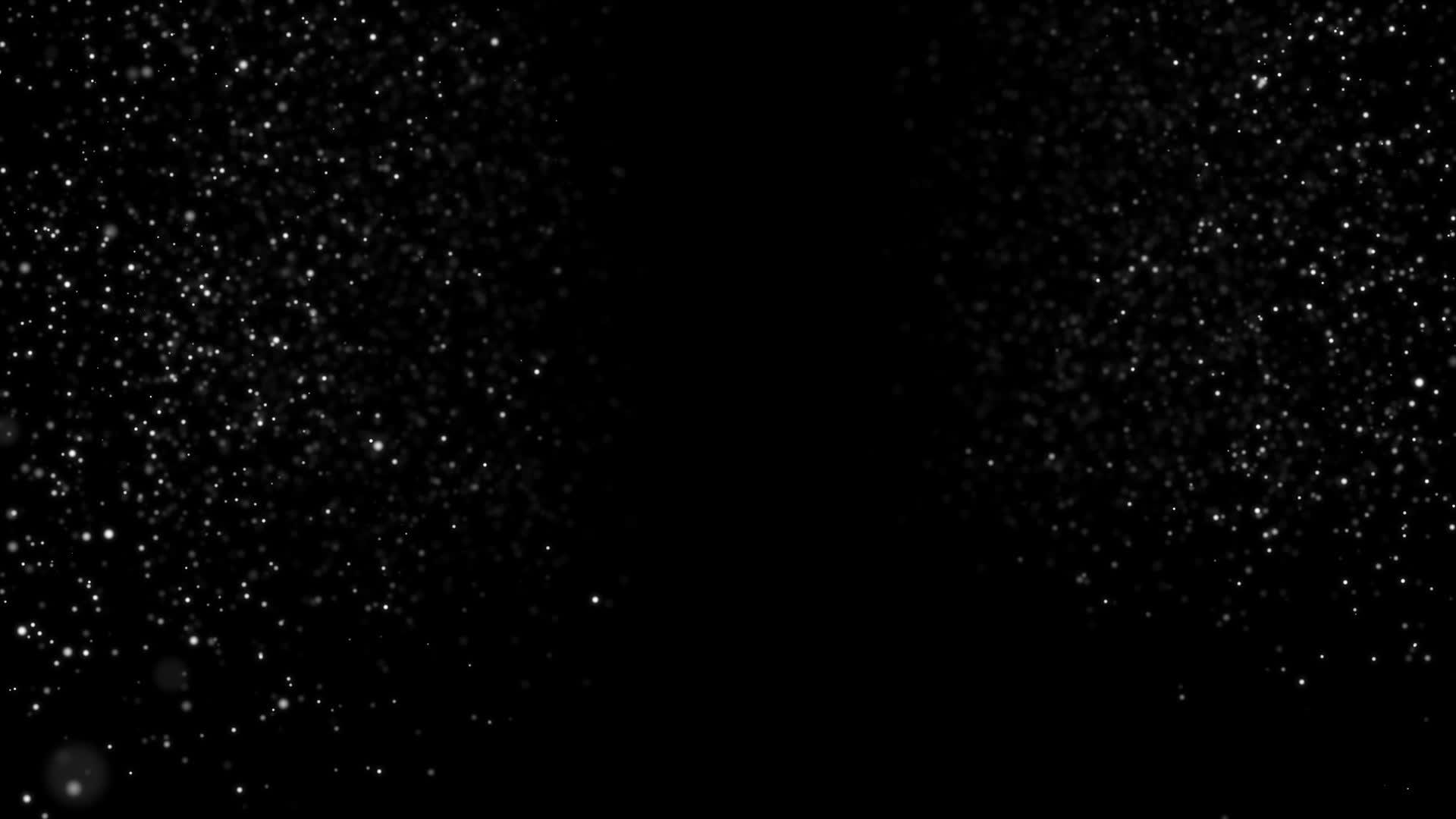 在黑色背景中以灰尘的形式出现hd粒子上缓慢下降视频的预览图