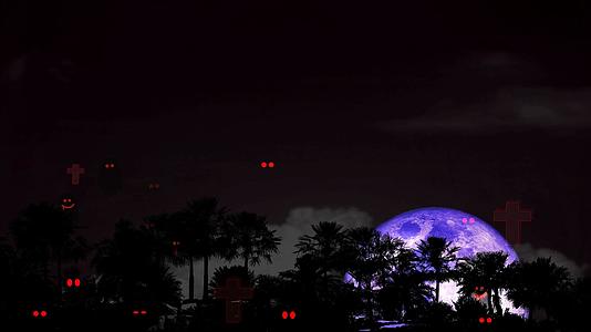 夜空中的圣月血月影棕榈树和烈灵红墓视频的预览图