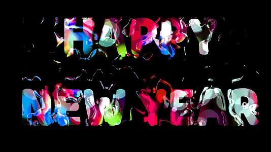 新年快乐文字标记彩虹光和水湿运动视频的预览图