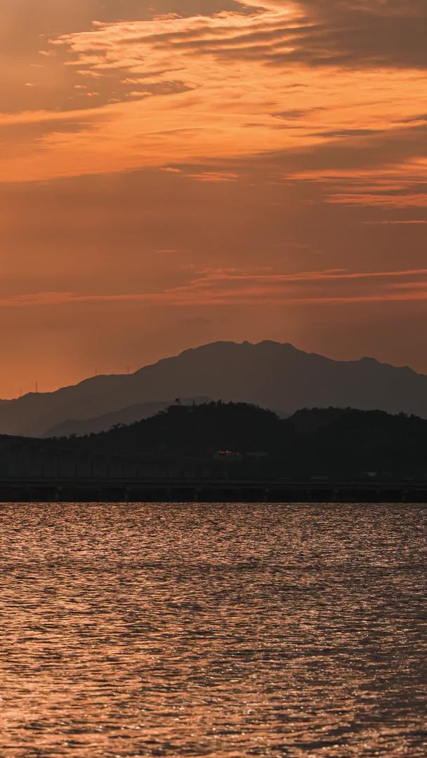 延迟浙江玉环漩门湾湿地公园夕阳素材视频的预览图