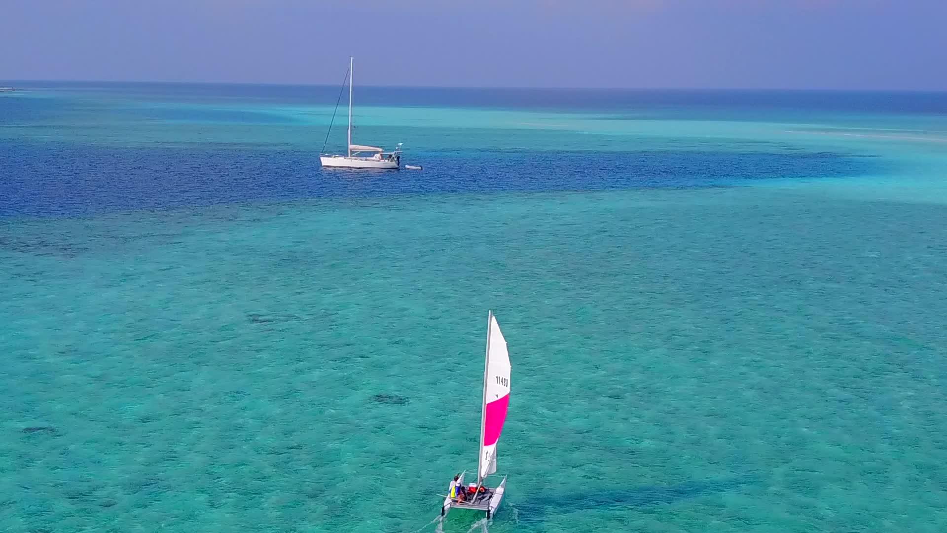 白沙底浅环礁湖海岸沉积海岸海滩时间无人飞机空中视频的预览图