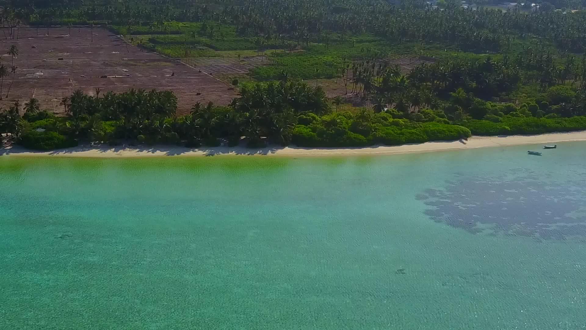 白沙背景蓝绿色海洋异国情调海湾海滩度假的空气性质视频的预览图