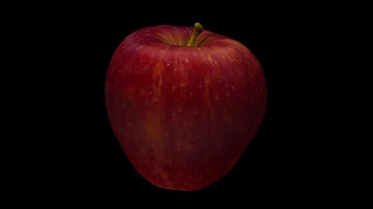 在黑色背景04上旋转美味的红苹果视频的预览图