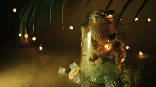 用于家居装饰的热带贝壳玻璃罐用于海滩主题室内装饰视频的预览图