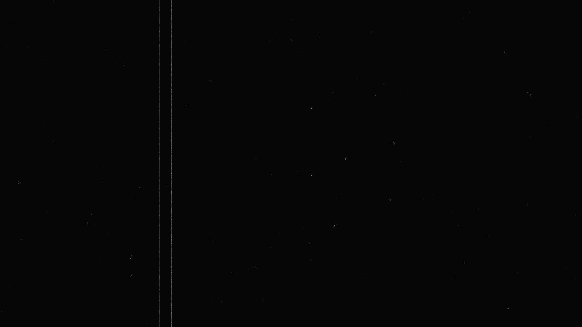 黑色背景的黑色底框上用纤维和谷物仿旧胶片覆盖表面视频的预览图