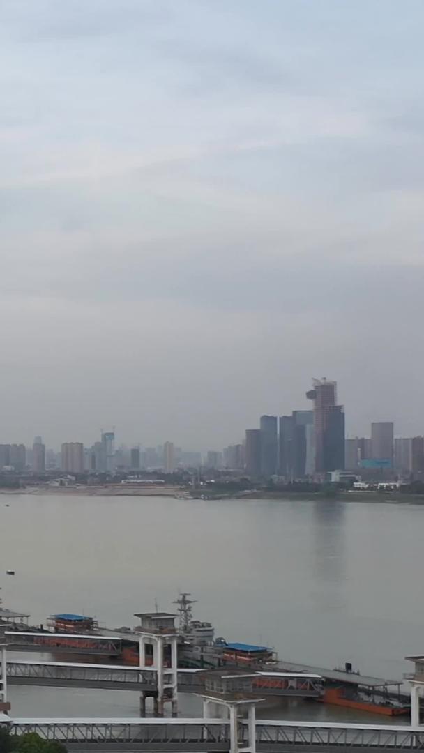 航拍环绕国旗五星红旗城市江景爱国教育素材视频的预览图