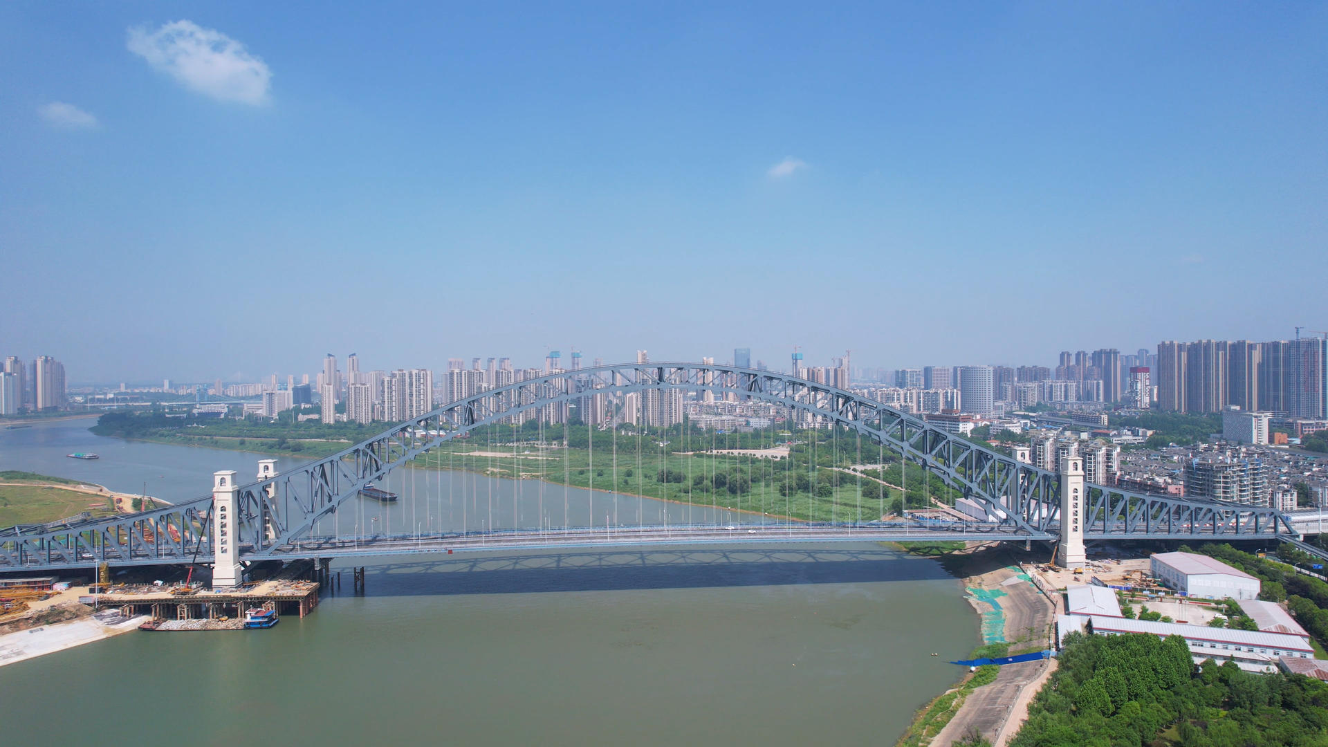 航拍武汉古田桥蓝天白云晴朗天空下的道路桥梁4k素材视频的预览图