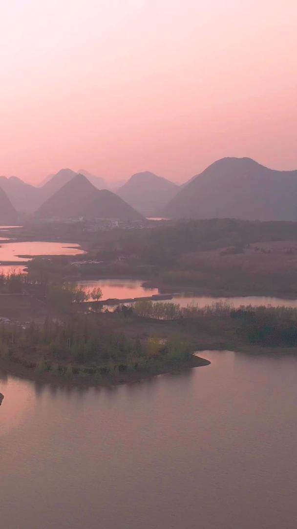 航拍日落时分贵州网红打卡樱花谷视频素材视频的预览图
